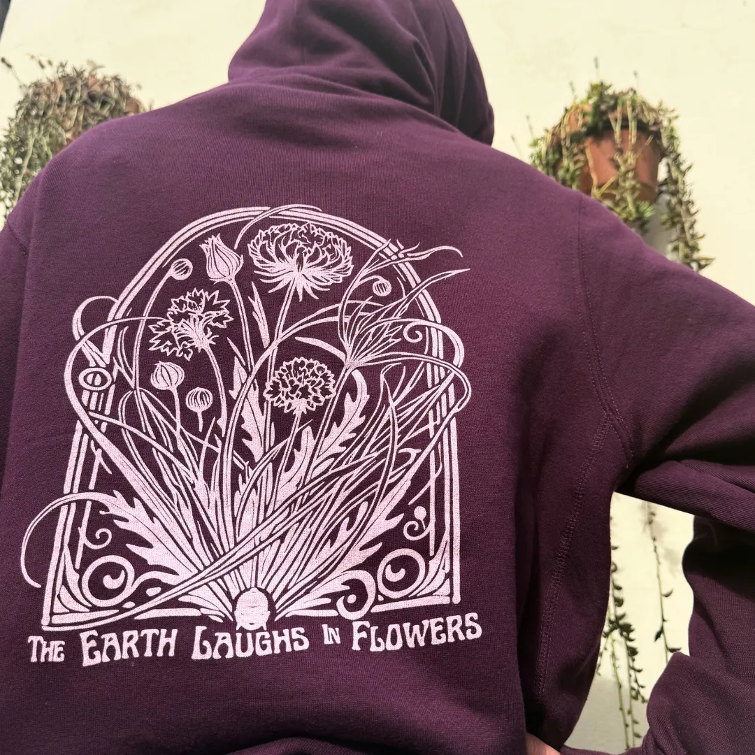 The Earth Laughs In Flowers
